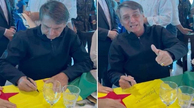 Bolsonaro autografa bandeira do Acre e diz querer visitar estado em breve “se Deus quiser”